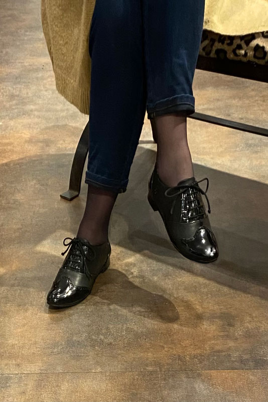 Gloss black women's fashion lace-up shoes. Round toe. Flat leather soles. Worn view - Florence KOOIJMAN